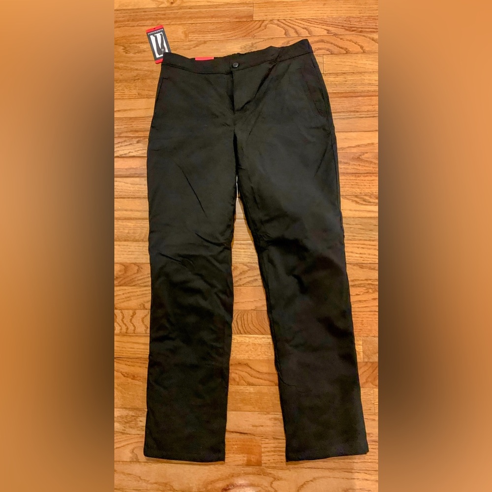 Ladies Medium insulated black pants.  Stormpak. New with tags. No problems.